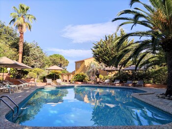 2 outdoor pools, open 9:00 AM to 8:00 PM, pool umbrellas, sun loungers