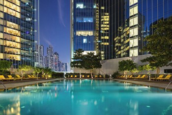 Outdoor pool, pool umbrellas, sun loungers