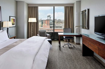 Outdoor pool, open 5:00 AM to 9:00 PM, pool umbrellas, pool loungers