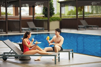 Outdoor pool, open 6:30 AM to 9:00 PM, free cabanas, pool umbrellas