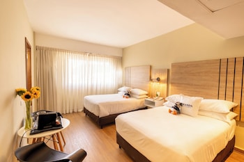 Premium bedding, down comforters, minibar, in-room safe