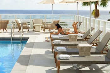 Outdoor pool, pool umbrellas, sun loungers