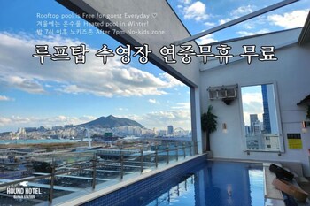 Outdoor pool, open 7:00 AM to midnight, pool umbrellas, sun loungers