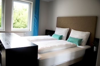 Chambre double | Salle de bain | Douche, articles de toilette (gratuits), séchoir à cheveux