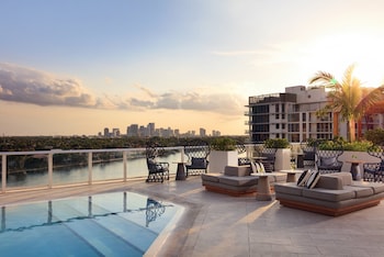 2 outdoor pools, open 7:00 AM to 9:00 PM, pool loungers