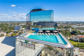 Outdoor pool, open 8:00 AM to 8:00 PM, sun loungers