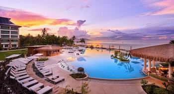 Outdoor pool, open 7:00 AM to 7:00 PM, cabanas (surcharge)