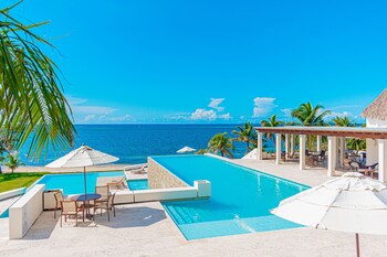 2 outdoor pools, pool umbrellas, sun loungers