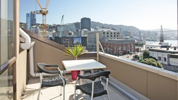 Apartamento, 2 quartos, banheiro privativo | Cozinha privada | Geladeira, micro-ondas, fogão, cooktop