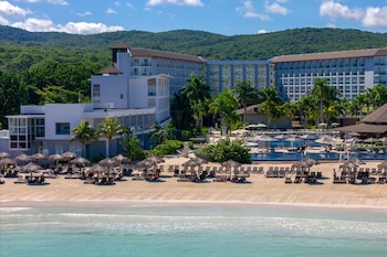 On the beach, white sand, free beach cabanas, sun loungers