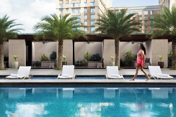 Outdoor pool, open 8:00 AM to 7:00 PM, pool umbrellas, pool loungers
