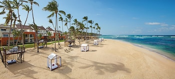 On the beach, sun-loungers, beach umbrellas, beach towels