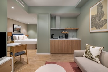 Appartement Deluxe | Coin séjour | Télévision