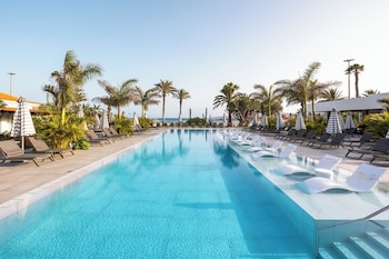 Outdoor pool, pool umbrellas, pool loungers