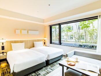Deluxe Room, 2 Single Beds, Bathtub | Balcony view
