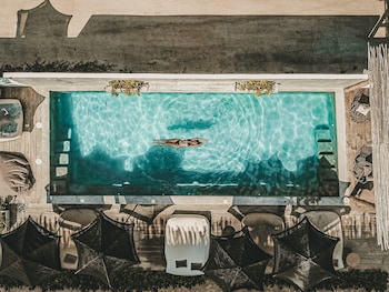 Outdoor pool, pool umbrellas, pool loungers