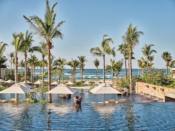 3 outdoor pools, cabanas (surcharge), pool umbrellas