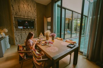 2 outdoor pools, open 7:00 AM to 9:00 PM, pool umbrellas, sun loungers