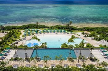 On the beach, sun loungers, beach umbrellas, beach towels