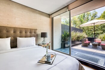 Premium bedding, down duvets, pillow-top beds, in-room safe