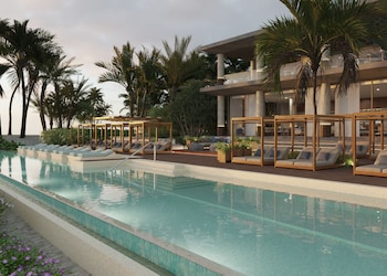 2 outdoor pools, pool umbrellas, pool loungers