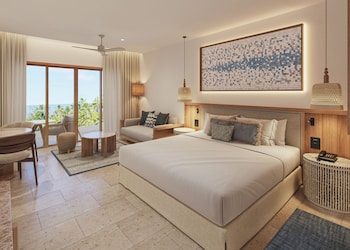 2 outdoor pools, pool umbrellas, sun loungers