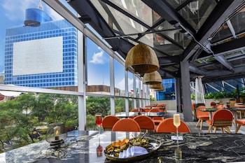 Daily buffet breakfast (USD 18 per person)