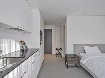 Superior Apartment | Living area | 43-cm flat-screen TV with digital channels, offices