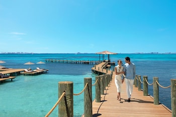 4 outdoor pools, open 7:00 AM to 8:00 PM, pool umbrellas, sun loungers