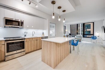Luxury Apartment, 1 Bedroom (Room décor/layout/colors vary by unit) | Living area | 42-inch flat-screen TV with cable channels, TV, Netflix