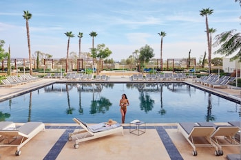 Seasonal outdoor pool, pool umbrellas, pool loungers