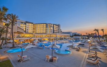 Private beach, white sand, sun loungers, beach umbrellas