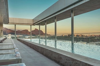 Outdoor pool, open 8 AM to 7:00 PM, sun loungers, lifeguards on site