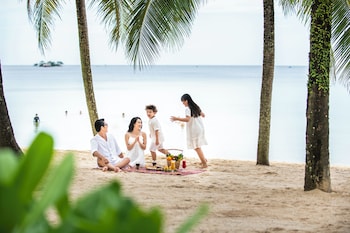 Private beach, white sand, sun-loungers, beach umbrellas
