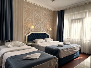 Standard Triple Room | Egyptian cotton sheets, premium bedding, memory-foam beds, minibar