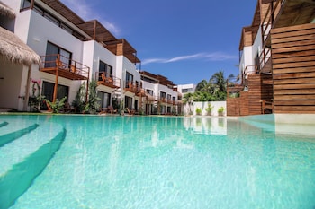 On the beach, sun loungers, beach towels