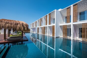 Indoor pool, 3 outdoor pools, open 10:00 AM to 7:00 PM, pool umbrellas