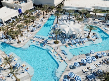 6 outdoor pools, cabanas (surcharge), pool umbrellas