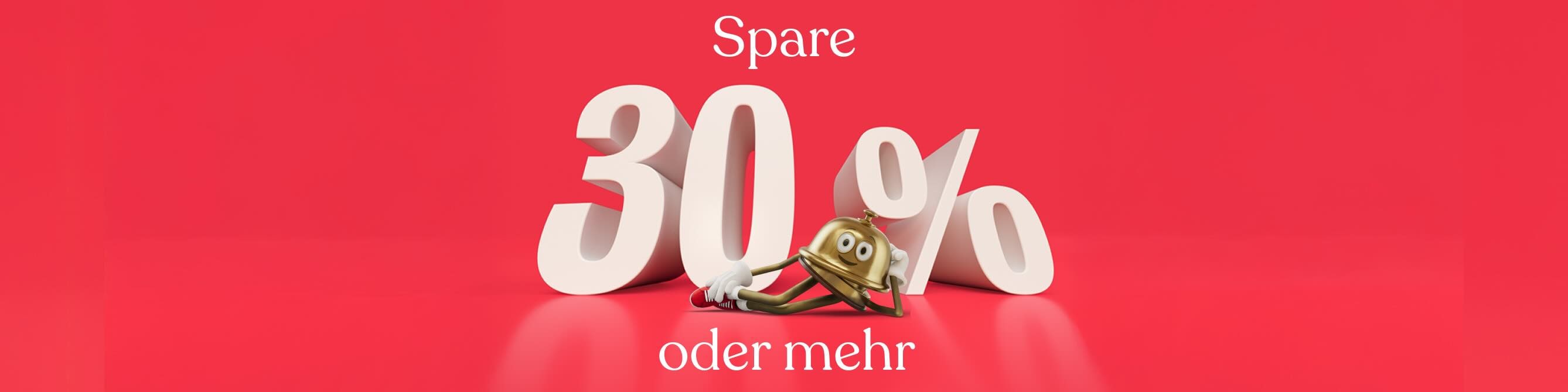 Bellboy, das Maskottchen von Hotels.com, liegt vor einem riesigen Schriftzug «Spare bis zu 30%».