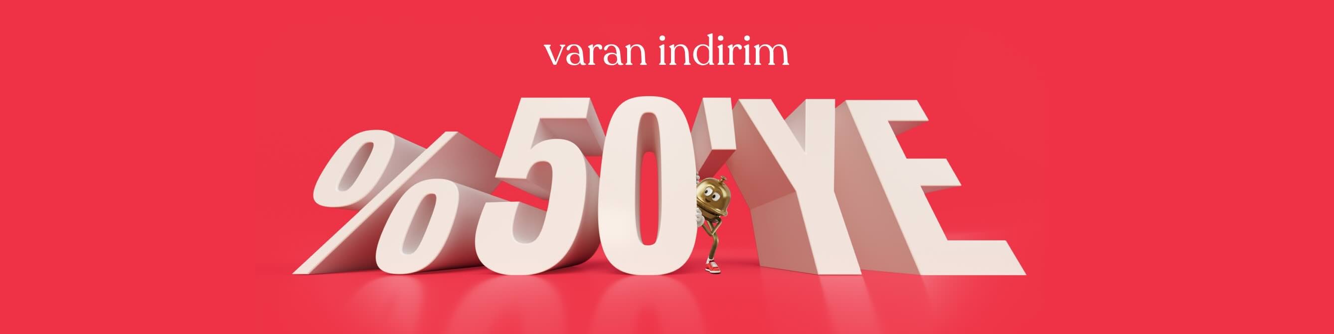 Hotels.com'un maskotu Bellboy, “%50 oranında kazanç elde edin” yazısının önünde uzanıyor.