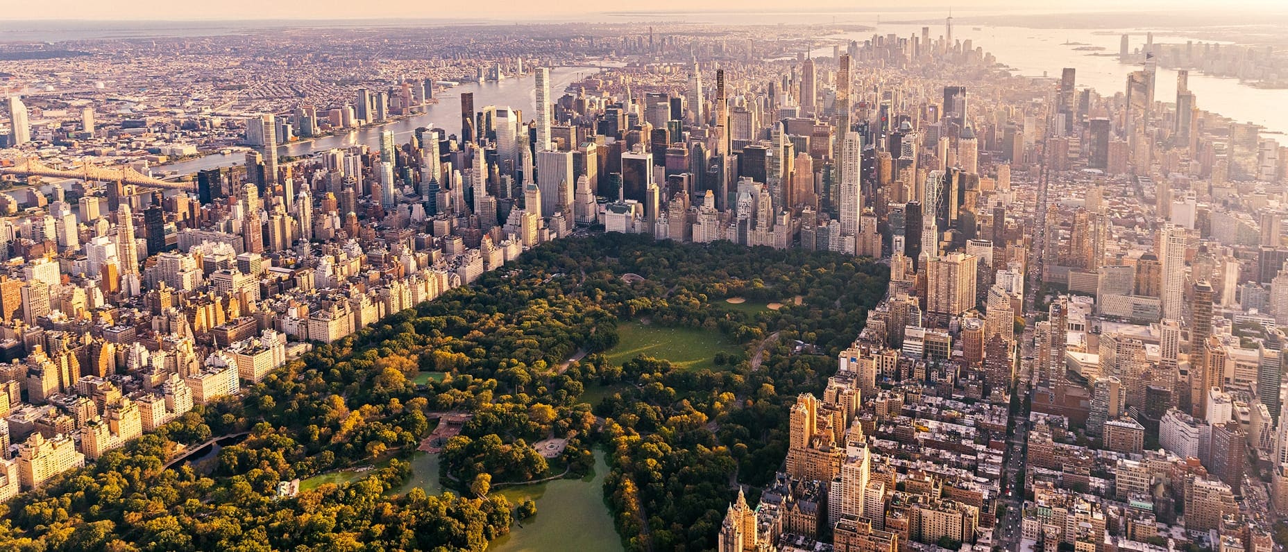 Aerial view of Manhattan with Central Park at golden hour.