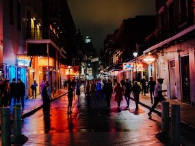 Visitors walking a dark