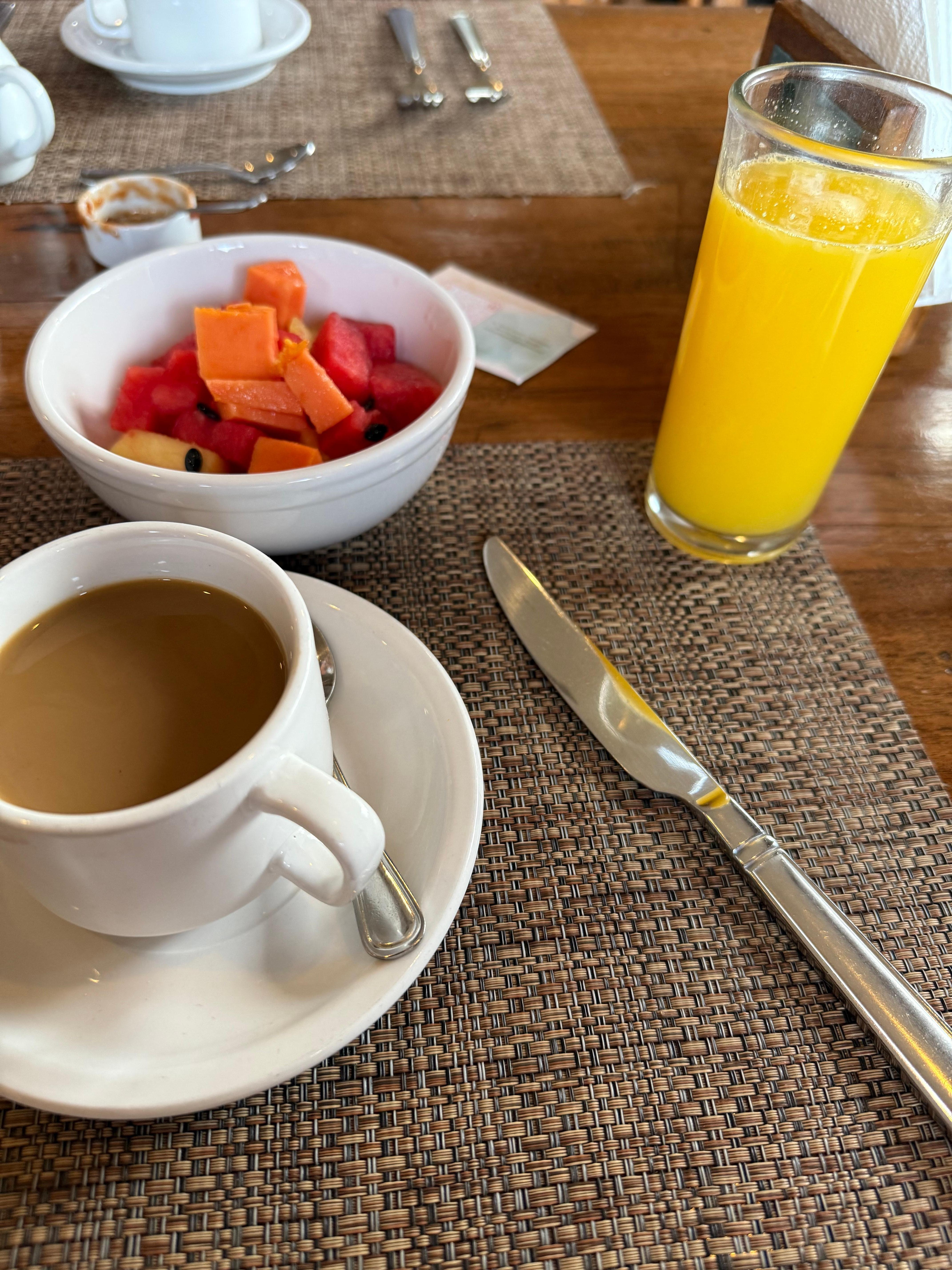 Breakfast, always fresh orange juice, coffee & fruit. 