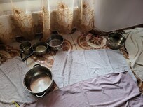 pots + towels to deal with the water in living room