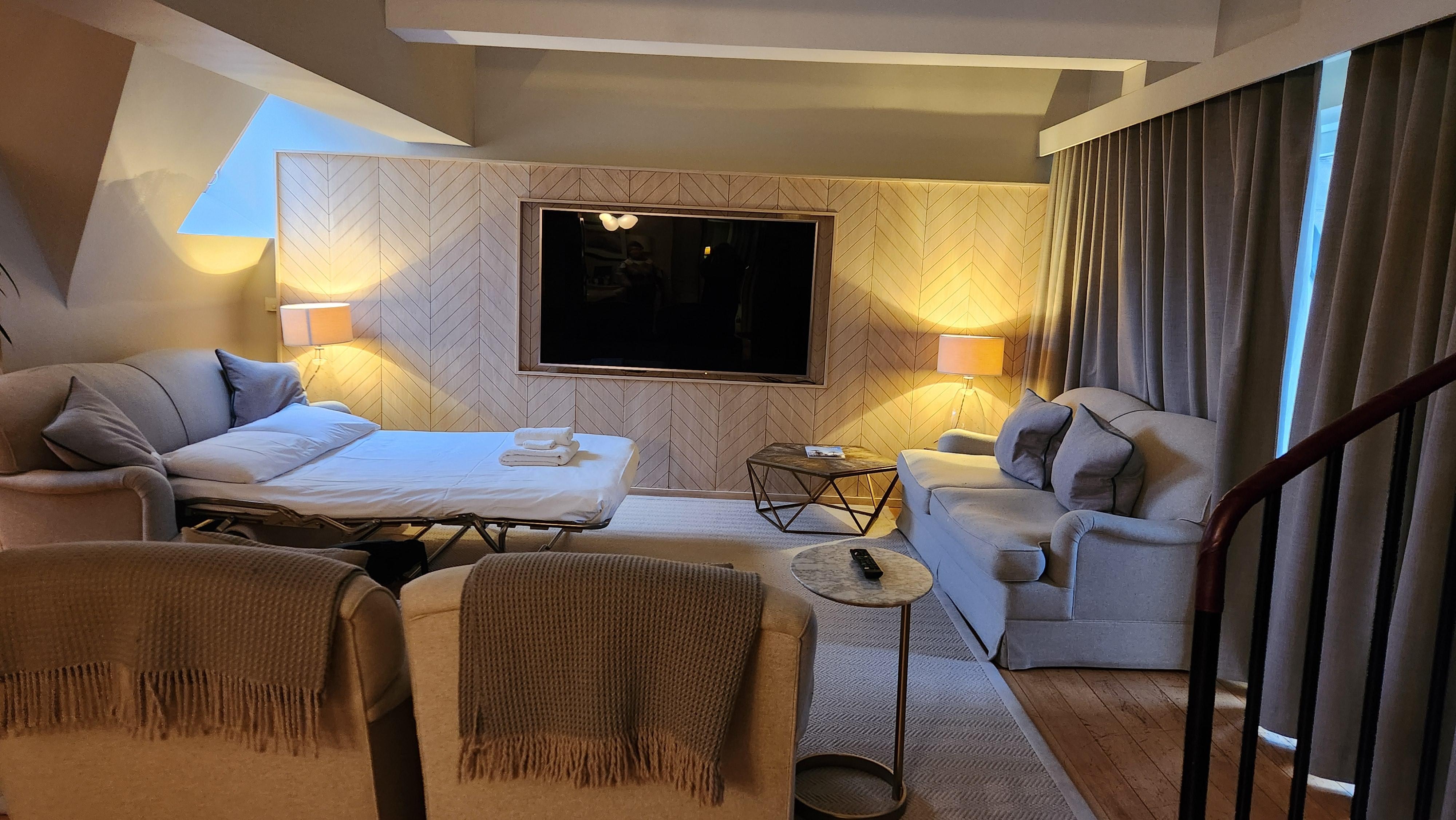 The living room with the pullout couch set up.