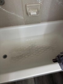 Disgusting slimy shower, caked with grime