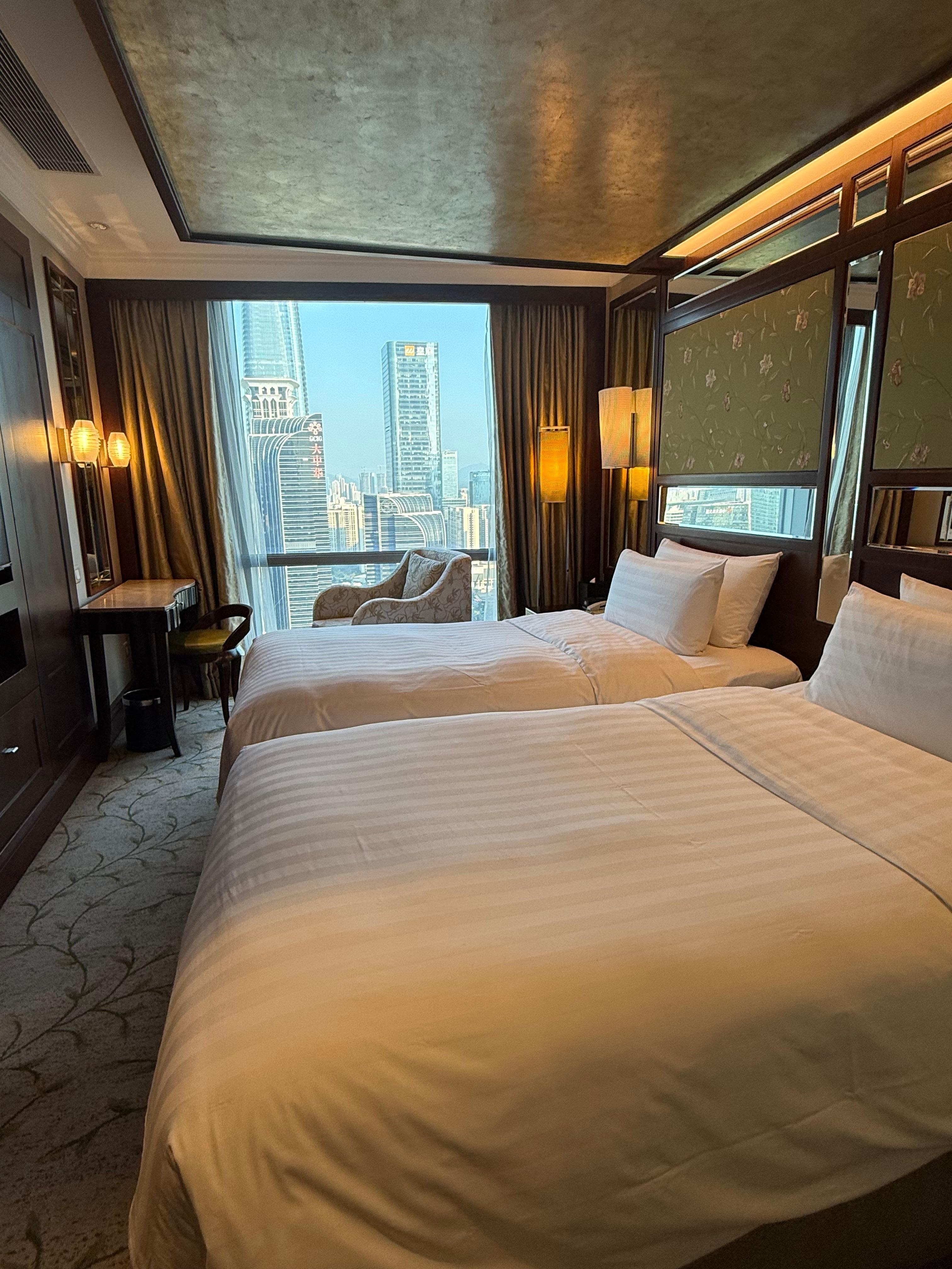 If you have 3 adults, take the Horizon executive room which offers amazing views and club lounge access 