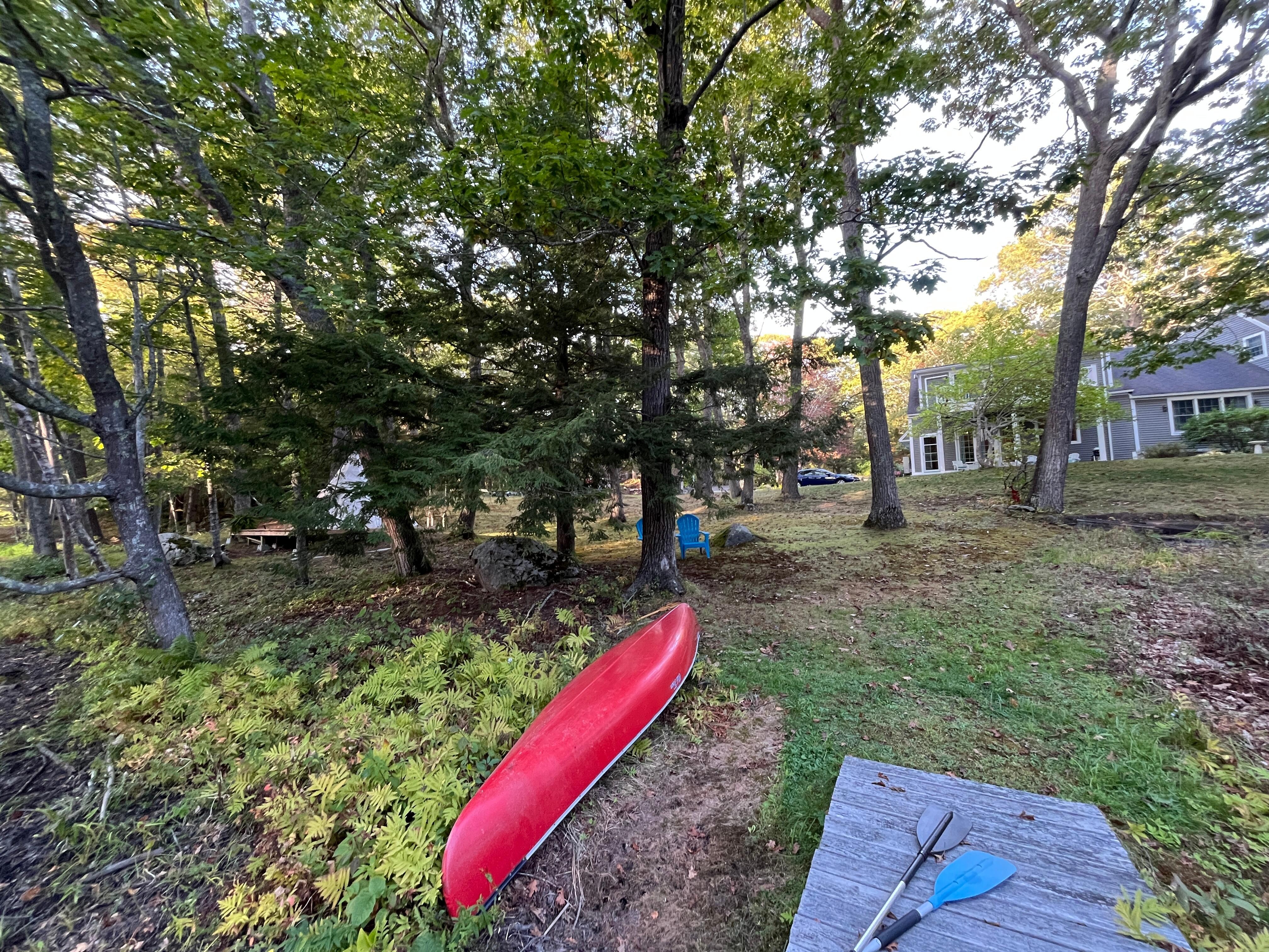 Taken standing on the dock facing the house. The canoe is in great shape.