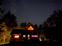 The cabin at night.