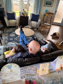 My sweet family enjoying some couch time before my shower started!